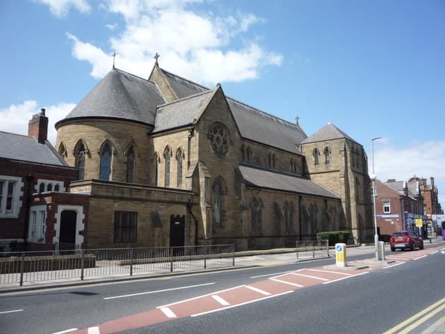 Roman Catholic Church of St Bede and attached Presbytery including attached walls and detached wall to south in South Shields, Tyne and Wear